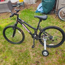 The price is firm.. 24-in Mongoose universal bicycle with adult training wheels