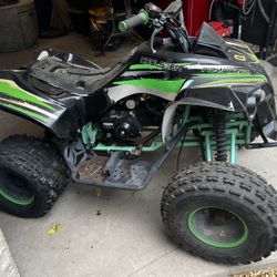 Used 125cc Four wheeler. + Helmet