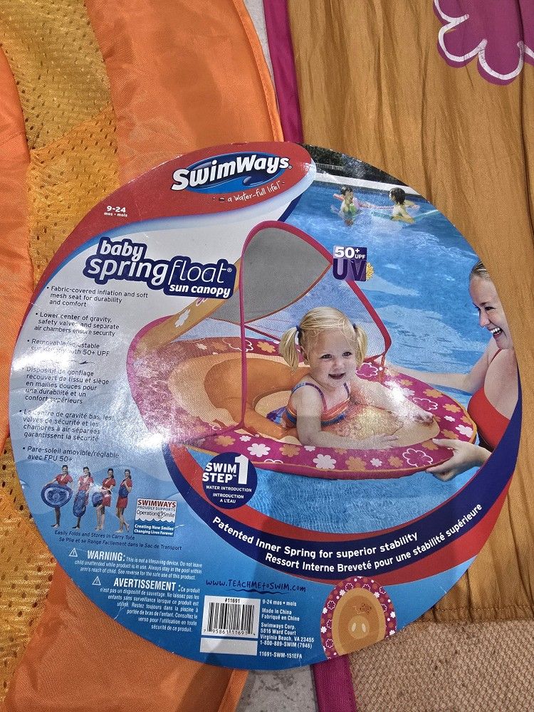 BABY FLOATY- NEW JUST TOOK IT OUT OF PACKAGE