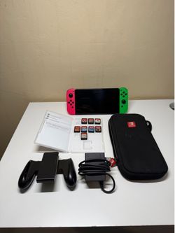 Nintendo Switch OLED Neon Joy-Cons + 8 Games + Dock + Charger