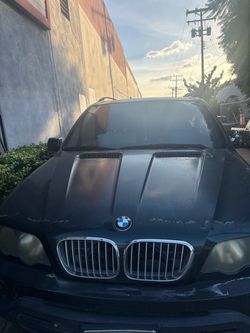 2002 BMW SUV Used  w/ pink slip