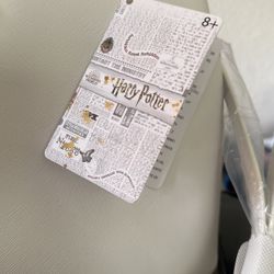 BRAND NEW HARRY POTTER EDITION PURSE 100$ FIRM