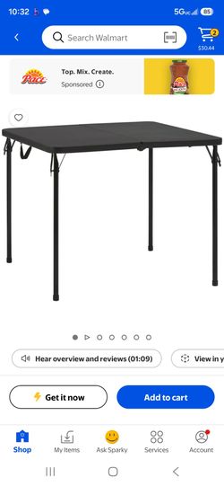 Black folding table and chairs