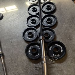 700 Pound Olympic Weights Bar Set