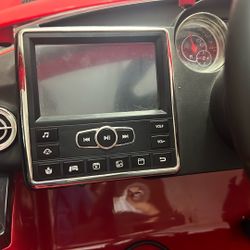 A Car For Kids And Lights On The Tires.