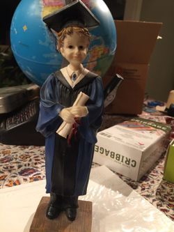 Graduation statue
