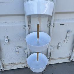 Three hanging plant holders