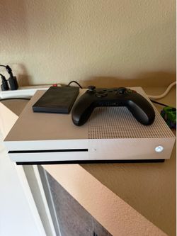 Xbox One S console with controller and Seagate external hard drive