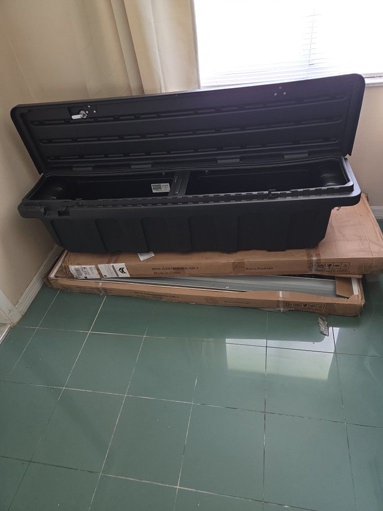 Toshiba forty inch, smart tv and yeah, a dz crossbody toolbox for a small pickup truck