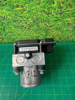 2012 Jaguar XF ABS Brake Pump Module CX23-2C405-AD OEM