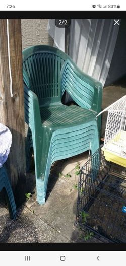 8 Sturdy Green plastic chairs