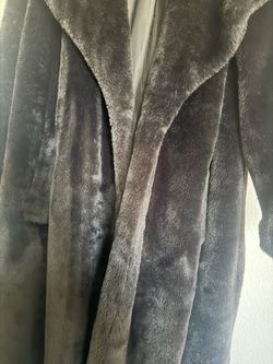 Black women’s fur coat