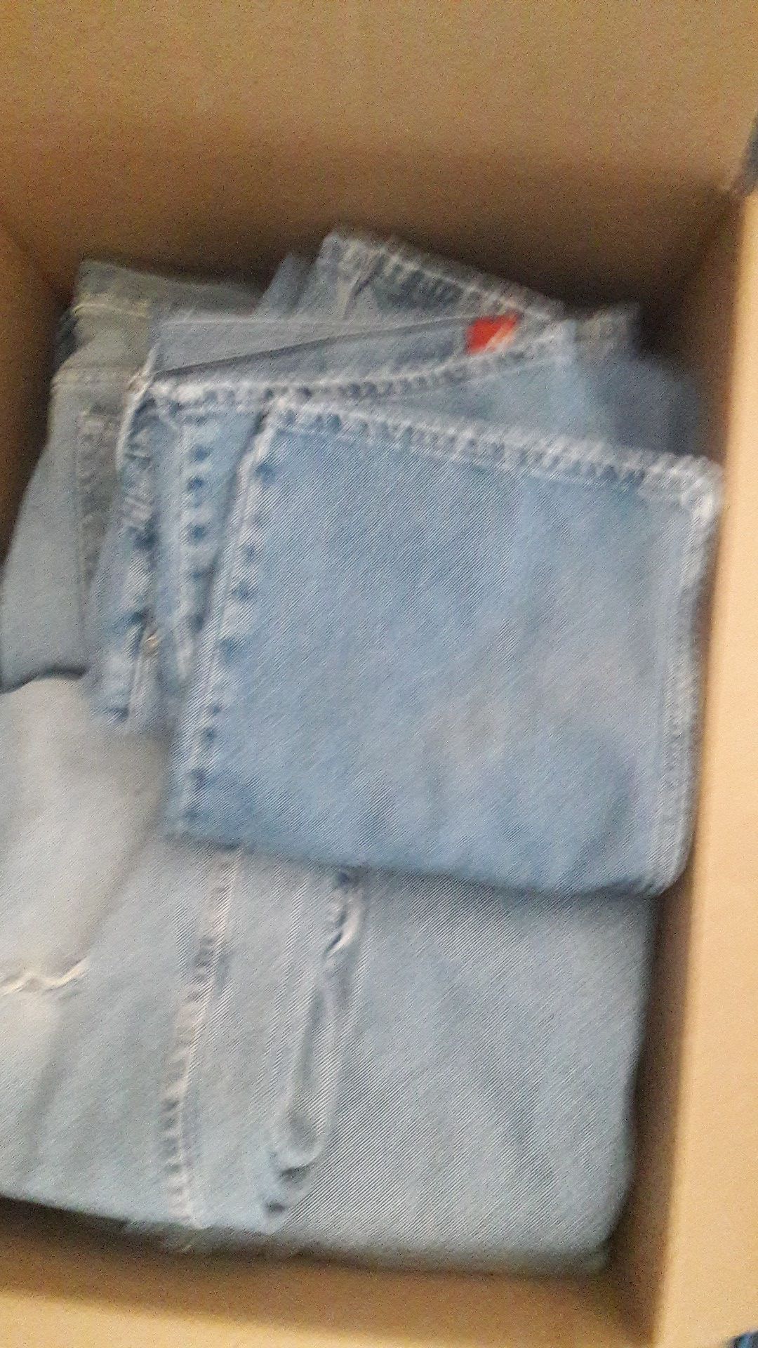 Large box men's used jeans