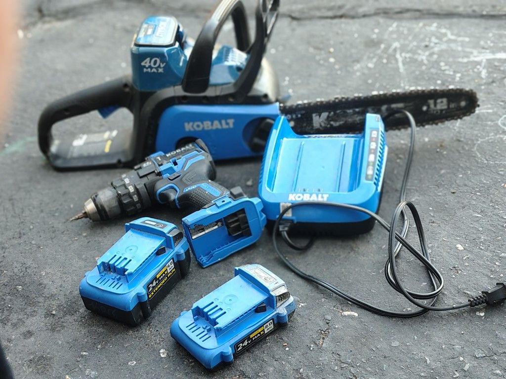 Kobalt Chainsaw With Charger Comes With A Drill XL Kobalt Drill With Two Batteries 