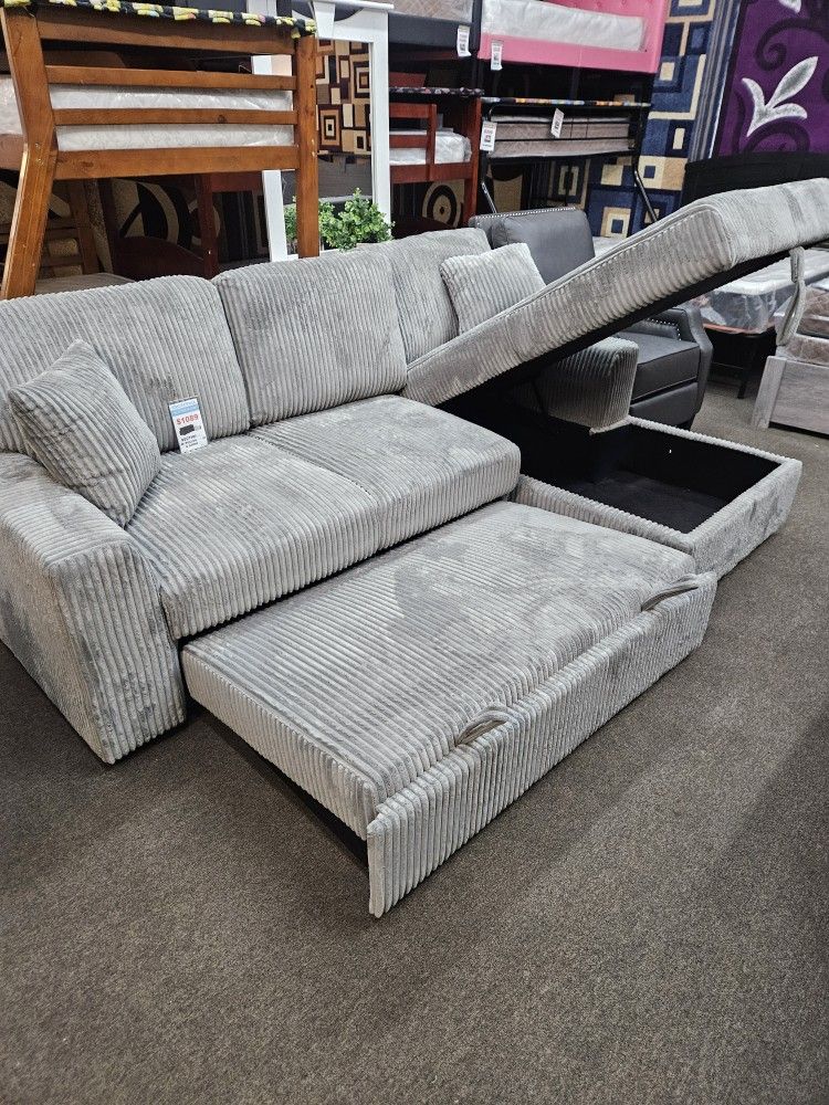 New sectional with pullobed and storage $899