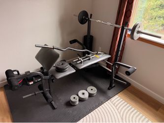 Weider weight bench and bars/weights