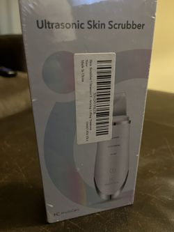 Ultrasonic face scrubber