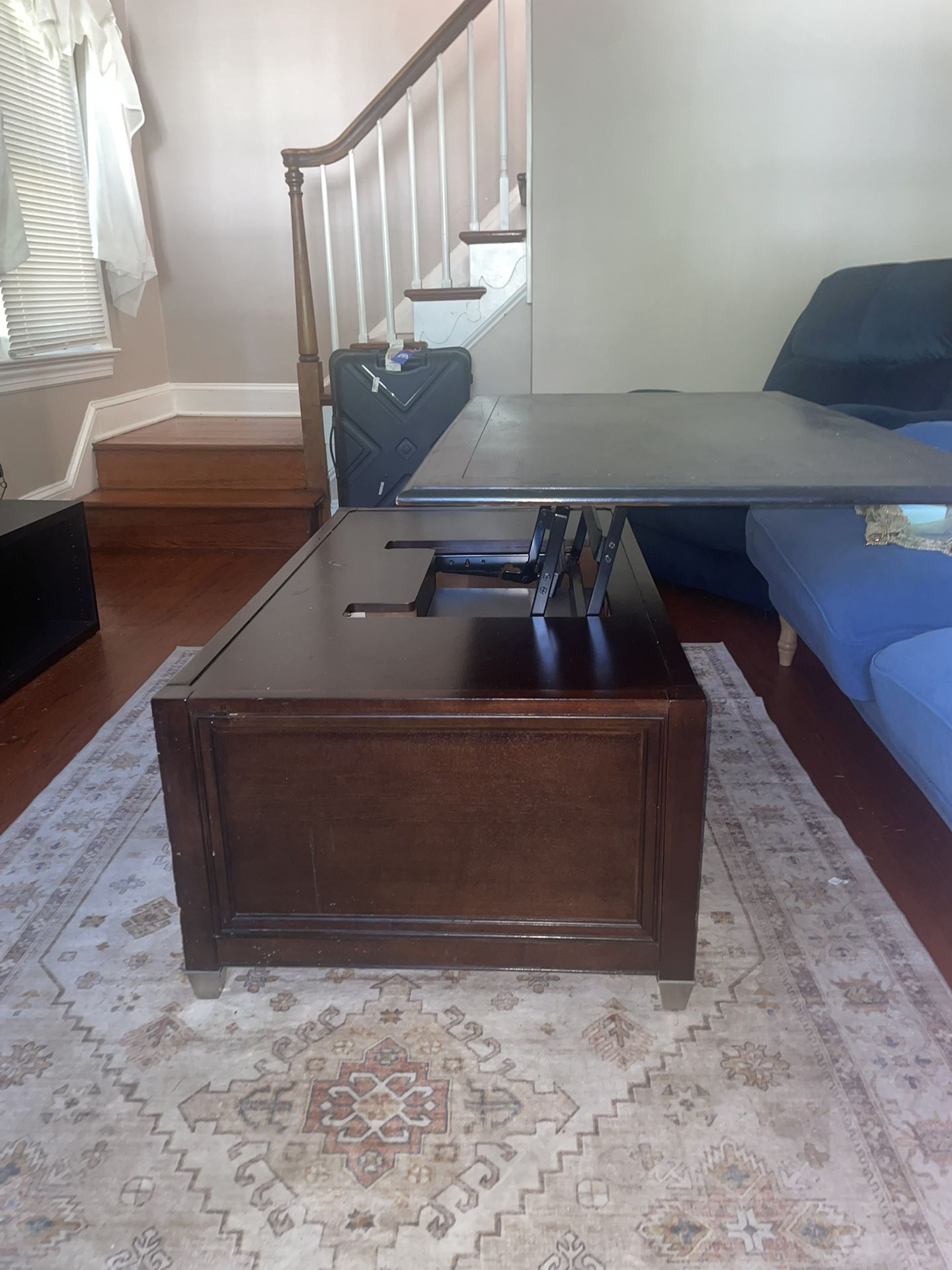 Lift-Top Coffee Table With Storage And Wheels