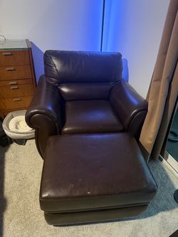 Brown leather couch + ottoman