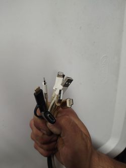 Five Apple iPhone chargers