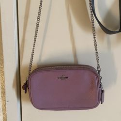 Lavender crossbody Coach purse 