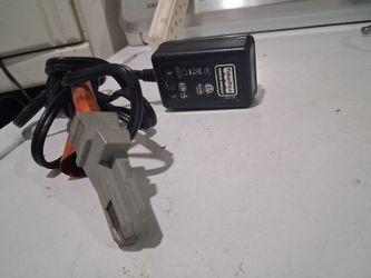 Fisher Price  POWER WHEELS charger. 
Class 2 battery charger. 

input: 120 V  =60 Hz  0.3 A

Output 12 V= 1.0A

good condition.