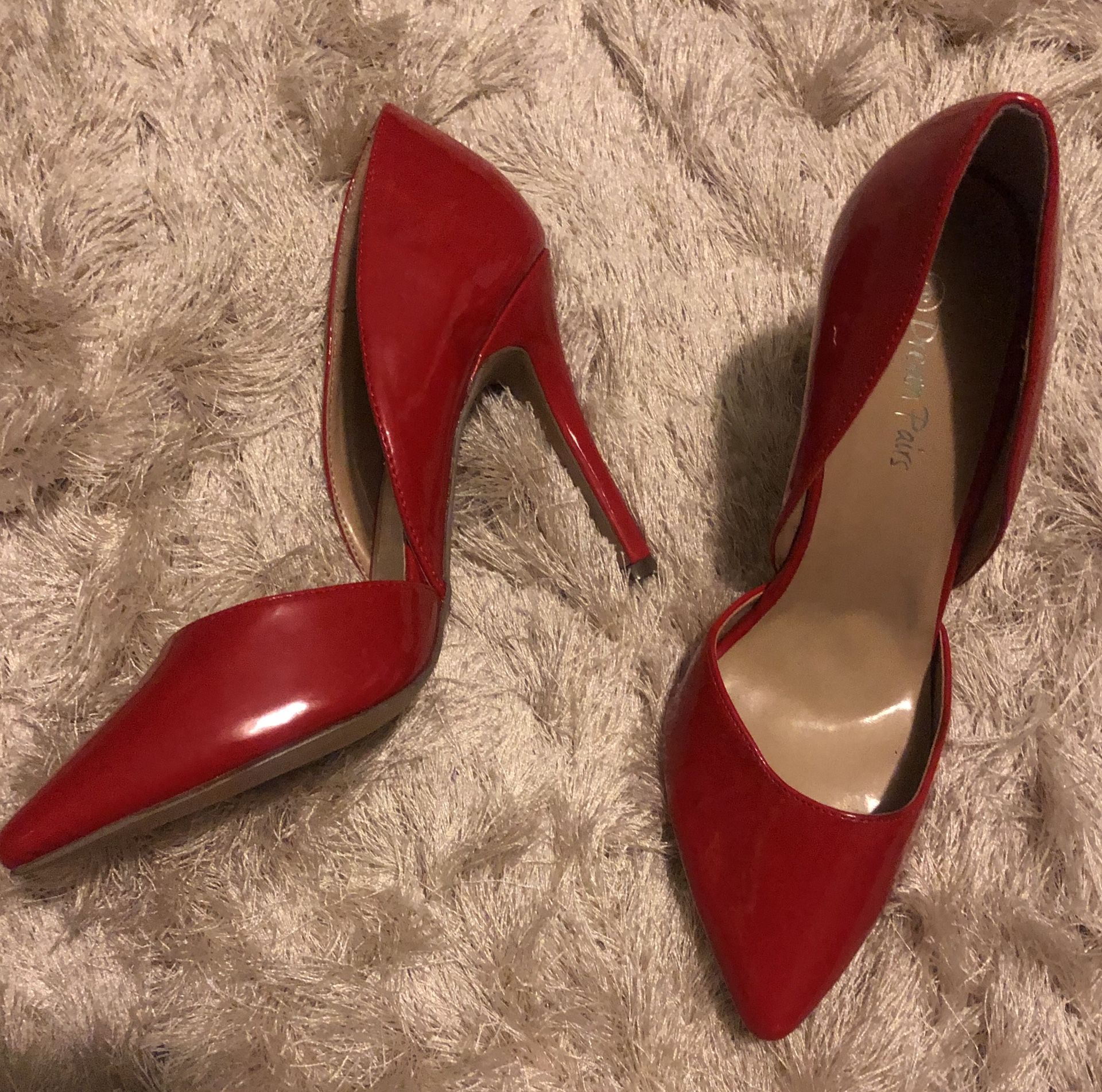 Never worn Red Pointed Toe Heels size 9