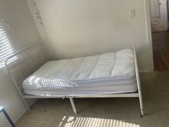 White twin bed
