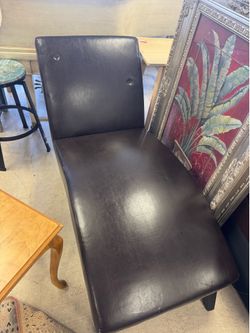Christopher Knight Home Finlay chaise lounge features a sleek, armless design upholstered in polyurethane faux leather
