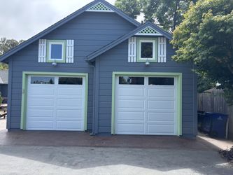 Two Amarr 8x8 Garage Doors + LiftMaster Openers – $1,200 OBO