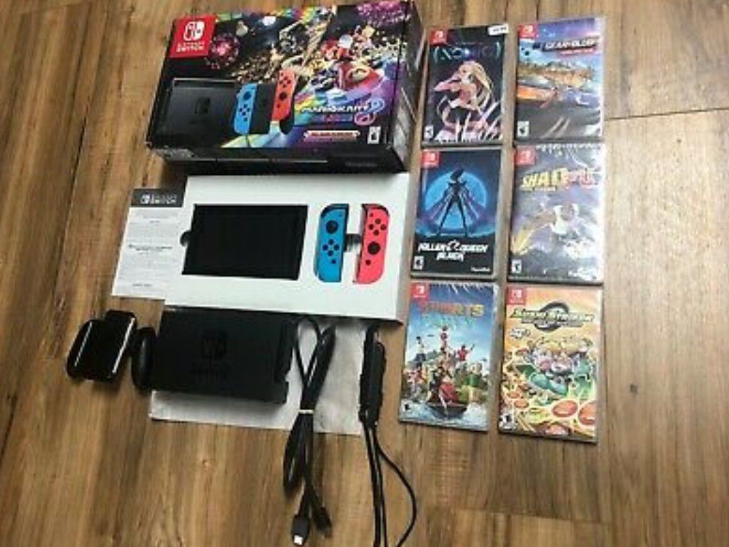 Like new red blue Nintendo switch console with 6 Games (can add 11 total if interested)