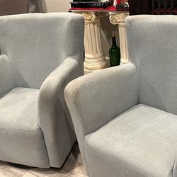Two Swivel Chairs