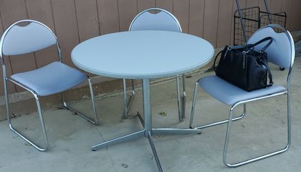 ROUND TABLE AND 3 CHAIRS