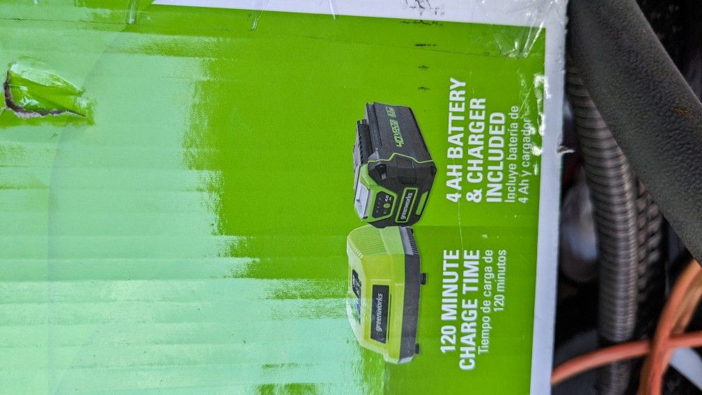 Brand New Green works Chainsaw 40 Volt Comes WITH Battery And Charger 14' I NCH Bar Auto Oiler Chain Break Etc