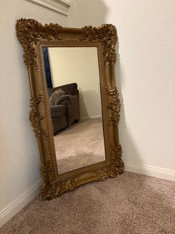 Ornate Gold Framed Mirror 39inches long, 20inches wide