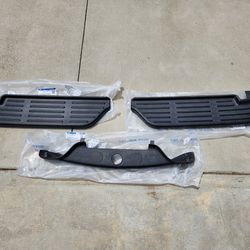 Factory Ford (OEM) rear bumper upper and lower step pads 