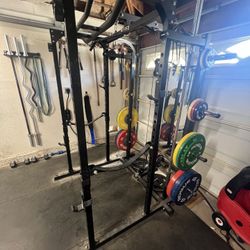 REP Fitness PR-1100 Squat Rack with lat pulldown and weight storage