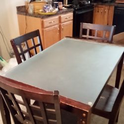 Vintage Glass/Wooden Table With 4 Chairs. MUST GO $50 AND CAN BE DELIVERED!