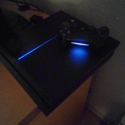 .PS4 With Wireless Remote And  Game..
