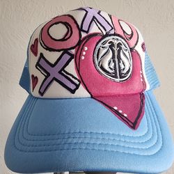 XOXO SYMBIOTIC MUSIC TRUCKERS HAT
