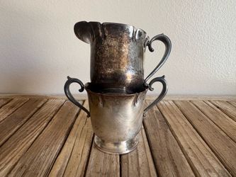 Antique pair of Portsmouth silver plate epic creamer sugar