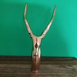 Brass Gazelle hole through beer tap handle possibly
