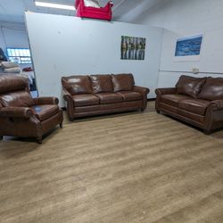 Woodley’s Brown Top Grain Leather Couch and Loveseat Set with Matching Power Recliner Chair