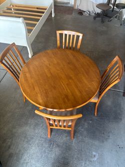 Solid Wood Round Dining Table With 4 Chairs by CoasterFine Furnitures