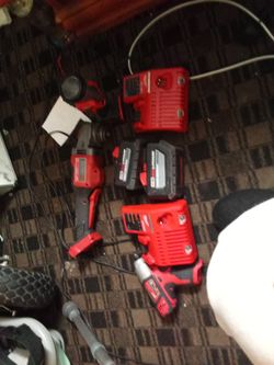 Milwaukee Grinder , Flashlight And Impact  2 Batteries And Two Chargers