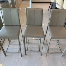 3 Grey Counter stools 