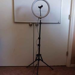 LED ring light on a tripod stand