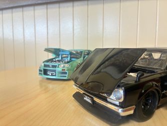 2002 Nissan skyline GTRR 34 Jada toys  1971 Nissan skyline  &