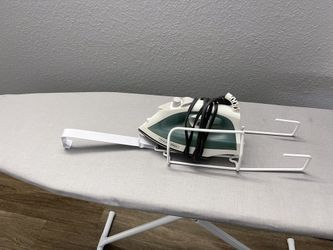 Ironing board with iron