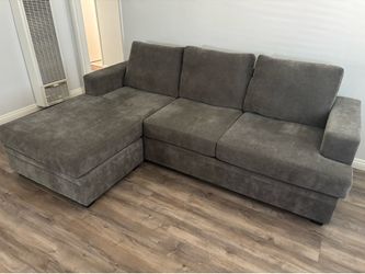 Dark gray couch and compact lazy boy